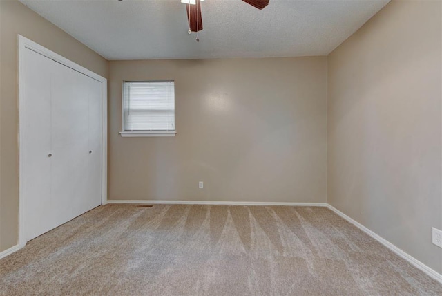 3708 Greenway Ter, Del City, OK 73115 - unfurnished bedroom featuring carpet floors, a closet, and ceiling fan