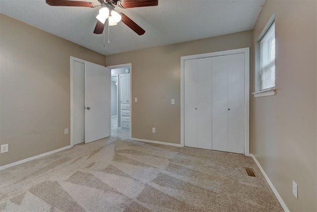 3708 Greenway Ter, Del City, OK 73115 - unfurnished bedroom with carpet flooring, ceiling fan, and a textured ceiling