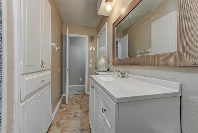3708 Greenway Ter, Del City, OK 73115 - bathroom featuring vanity and stone finish flooring