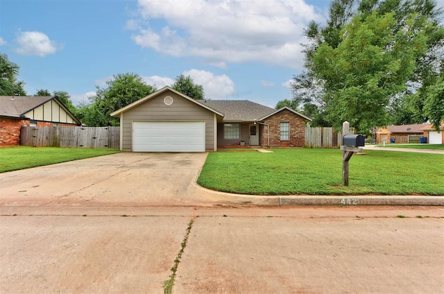 442 W Apple Branch Way, Mustang, OK 73064 - view of front of home with an attached garage, driveway, and brick siding