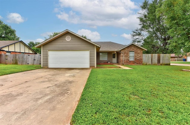 442 W Apple Branch Way, Mustang, OK 73064 - view of front of home featuring a garage, concrete driveway, brick siding, and a shingled roof