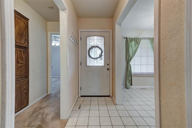 442 W Apple Branch Way, Mustang, OK 73064 - foyer entrance with light tile patterned flooring and baseboards