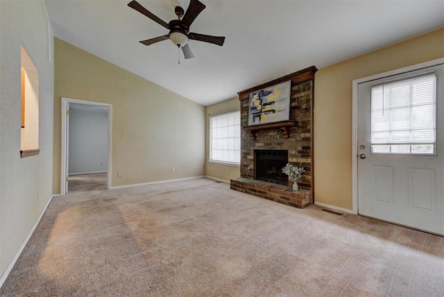 442 W Apple Branch Way, Mustang, OK 73064 - unfurnished living room with vaulted ceiling, a ceiling fan, carpet, and a fireplace