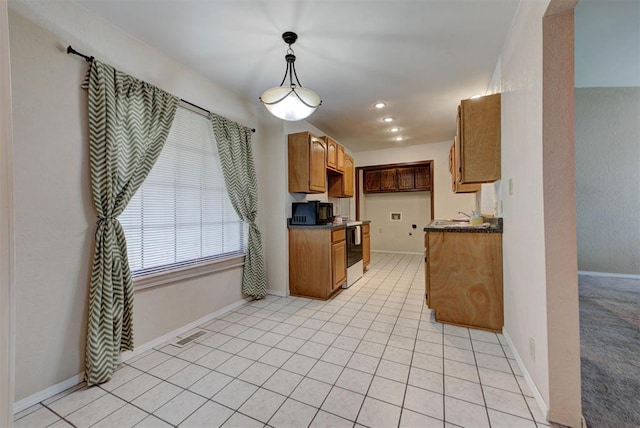 442 W Apple Branch Way, Mustang, OK 73064 - kitchen with electric range, dark countertops, black microwave, decorative light fixtures, and light tile patterned floors