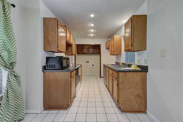 442 W Apple Branch Way, Mustang, OK 73064 - kitchen featuring black microwave, dark countertops, light tile patterned floors, electric stove, and recessed lighting