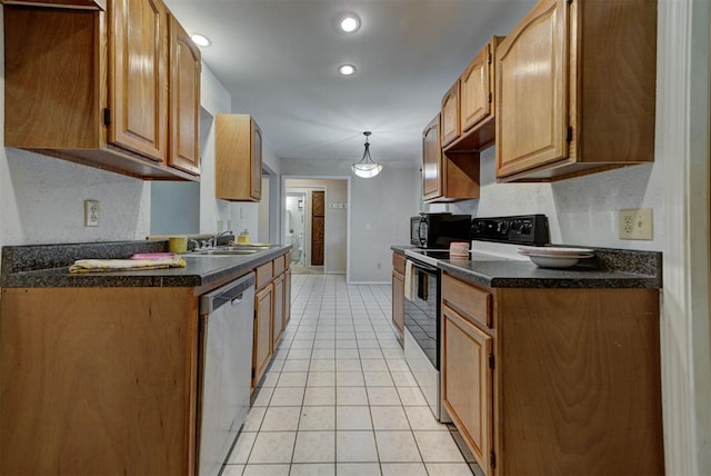 442 W Apple Branch Way, Mustang, OK 73064 - kitchen with black appliances, light tile patterned floors, dark countertops, and recessed lighting