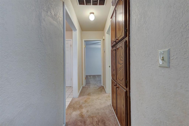 442 W Apple Branch Way, Mustang, OK 73064 - corridor with a textured wall and light colored carpet