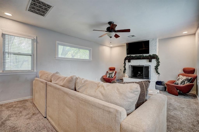 1701 Andover Ct, The Village, OK 73120 - carpeted living room with ceiling fan, a stone fireplace, and recessed lighting