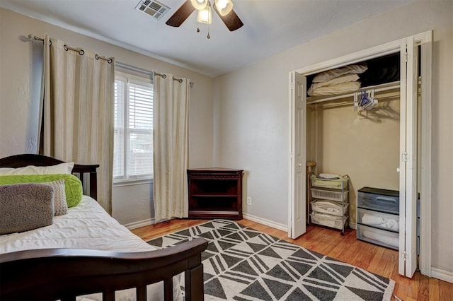 1701 Andover Ct, The Village, OK 73120 - bedroom featuring light wood-style floors, a closet, and ceiling fan