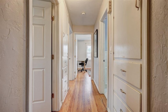 1701 Andover Ct, The Village, OK 73120 - hall with a textured wall and light wood-style flooring