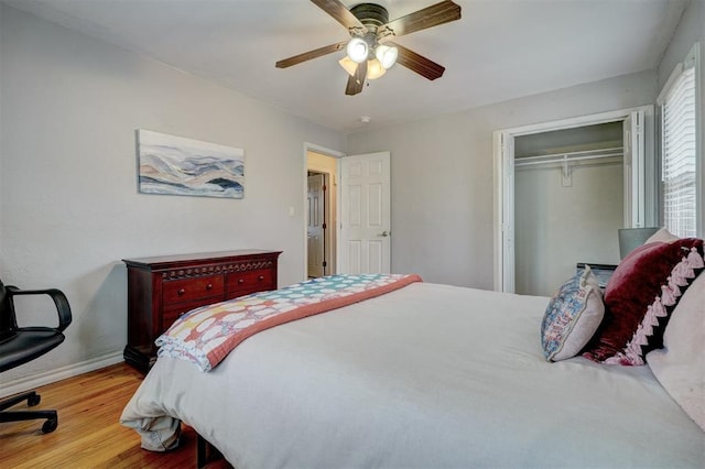 1701 Andover Ct, The Village, OK 73120 - bedroom with wood finished floors, a closet, and ceiling fan