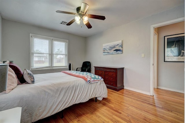 1701 Andover Ct, The Village, OK 73120 - bedroom featuring light wood-style flooring and a ceiling fan