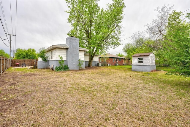 1701 Andover Ct, The Village, OK 73120 - fenced backyard featuring a storage shed