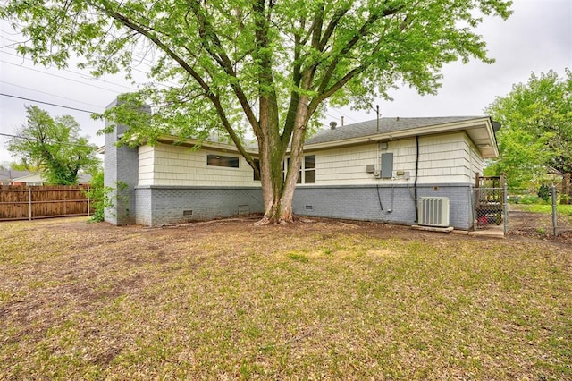 1701 Andover Ct, The Village, OK 73120 - back of house featuring a chimney, crawl space, and brick siding