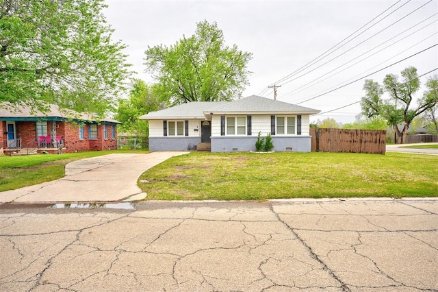 1701 Andover Ct, The Village, OK 73120 - view of front facade with driveway and brick siding