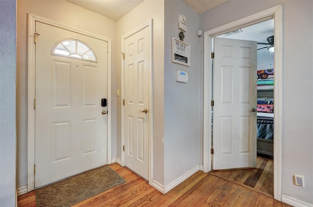 1701 Andover Ct, The Village, OK 73120 - entrance foyer with light wood finished floors and a ceiling fan