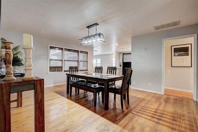 1701 Andover Ct, The Village, OK 73120 - dining area featuring light wood finished floors and baseboards