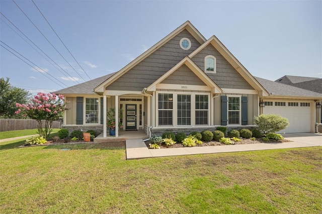 5521 N Miller Ave, Oklahoma City, OK 73112 - craftsman-style house with stone siding, board and batten siding, a garage, and driveway