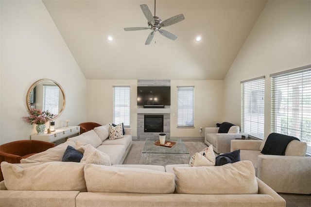 5521 N Miller Ave, Oklahoma City, OK 73112 - living area featuring high vaulted ceiling, a ceiling fan, a fireplace, and recessed lighting