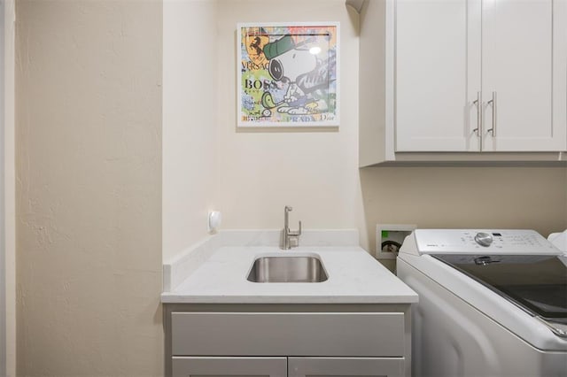5521 N Miller Ave, Oklahoma City, OK 73112 - laundry area with cabinet space and washing machine and dryer