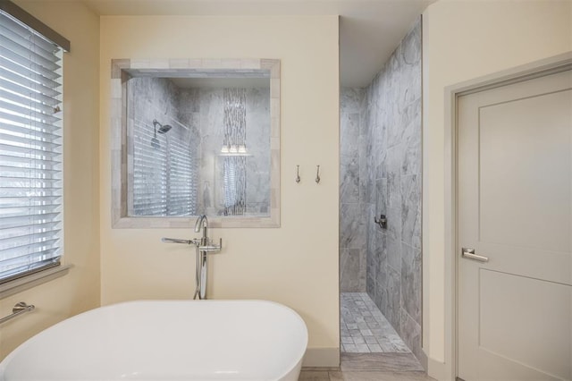 5521 N Miller Ave, Oklahoma City, OK 73112 - full bathroom featuring plenty of natural light, a freestanding bath, and a tile shower