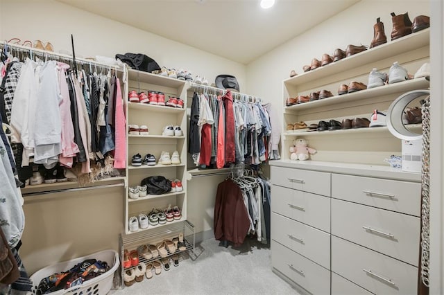 5521 N Miller Ave, Oklahoma City, OK 73112 - walk in closet with light colored carpet