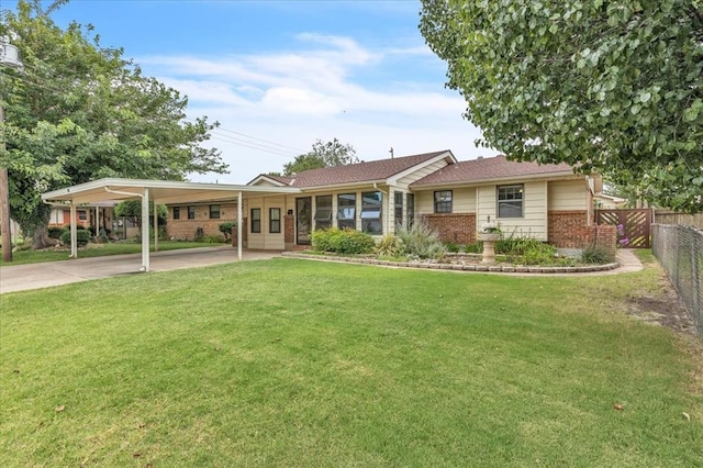 829 Arnold Ave, Moore, OK 73160 - ranch-style house with brick siding, concrete driveway, and a carport