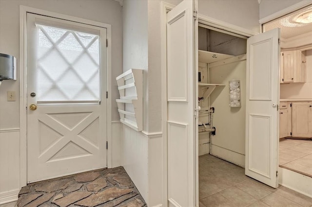 829 Arnold Ave, Moore, OK 73160 - doorway to outside with light tile patterned floors