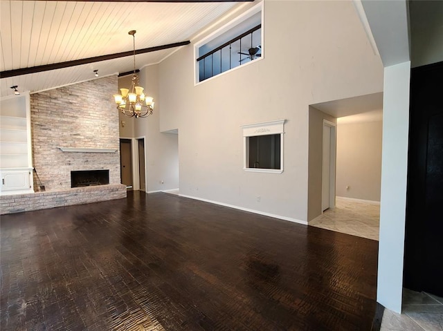 11208 NW 113th St, Yukon, OK 73099 - unfurnished living room featuring high vaulted ceiling, a chandelier, wooden ceiling, wood finished floors, and a fireplace