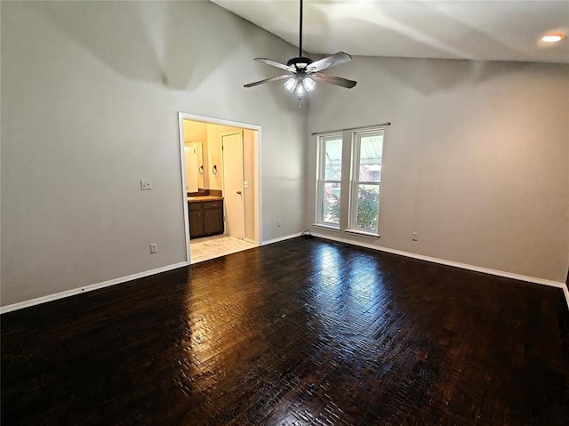 11208 NW 113th St, Yukon, OK 73099 - empty room with ceiling fan, wood finished floors, and high vaulted ceiling