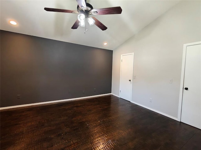 11208 NW 113th St, Yukon, OK 73099 - unfurnished room featuring ceiling fan, vaulted ceiling, dark wood finished floors, and recessed lighting