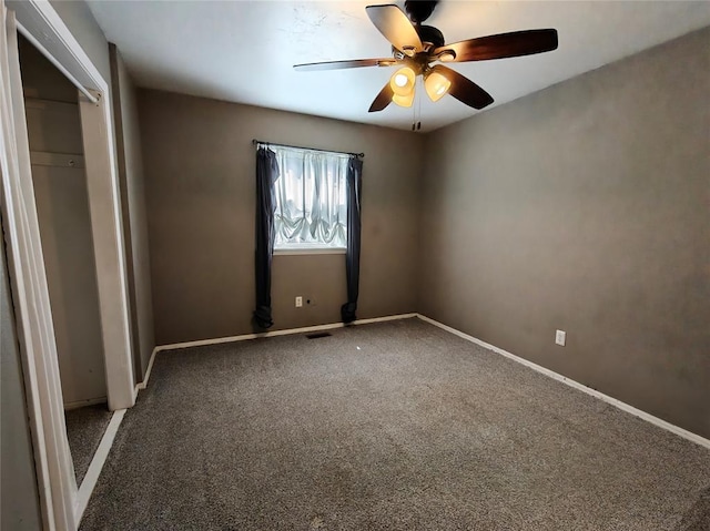 11208 NW 113th St, Yukon, OK 73099 - unfurnished bedroom featuring carpet and a ceiling fan