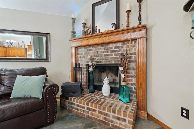 6005 SE 82nd Cir, Oklahoma City, OK 73135 - living area featuring wood finished floors and a fireplace