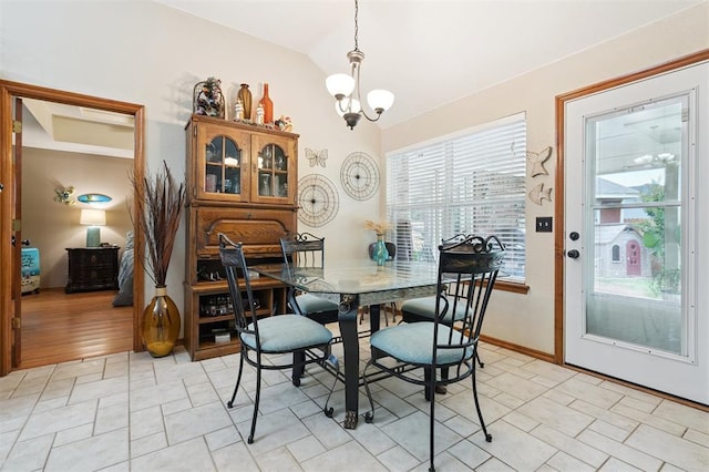 6005 SE 82nd Cir, Oklahoma City, OK 73135 - dining area featuring lofted ceiling and a chandelier