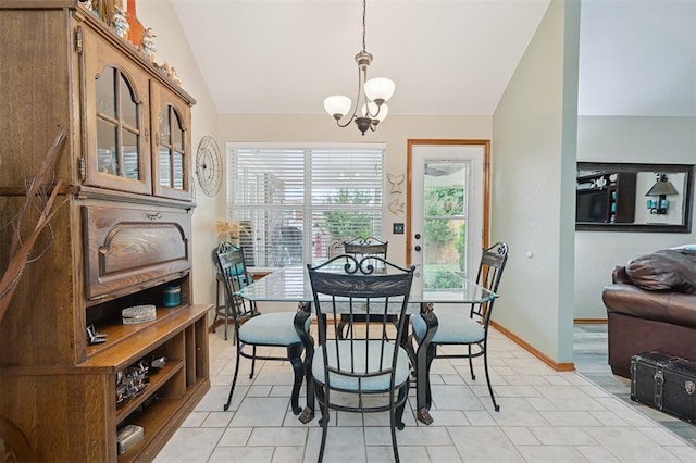 6005 SE 82nd Cir, Oklahoma City, OK 73135 - dining area featuring vaulted ceiling, a chandelier, and light tile patterned floors