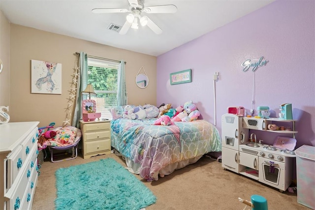 6005 SE 82nd Cir, Oklahoma City, OK 73135 - bedroom with light colored carpet and ceiling fan