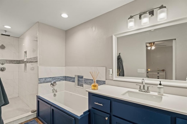 104 N Ramblin Oaks Dr, Moore, OK 73160 - full bath featuring a garden tub, vanity, ceiling fan, a tile shower, and recessed lighting