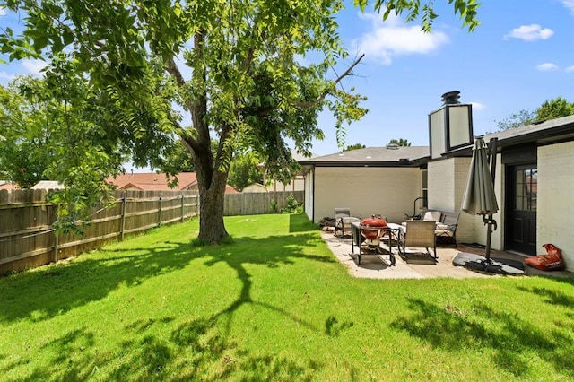 104 N Ramblin Oaks Dr, Moore, OK 73160 - fenced backyard featuring a patio area