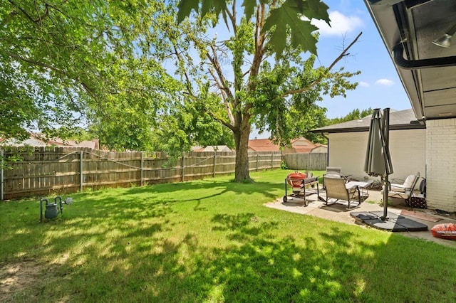 104 N Ramblin Oaks Dr, Moore, OK 73160 - fenced backyard featuring a patio