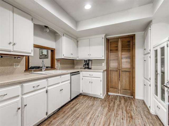 6708 Basswood Canyon Rd, Oklahoma City, OK 73162 - kitchen with dishwasher, white cabinetry, light countertops, and recessed lighting