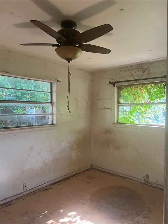 505 S Jackson Ave, Blanchard, OK 73010 - spare room with plenty of natural light and ceiling fan