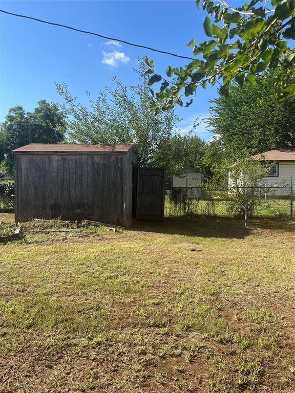 505 S Jackson Ave, Blanchard, OK 73010 - view of yard with a storage shed