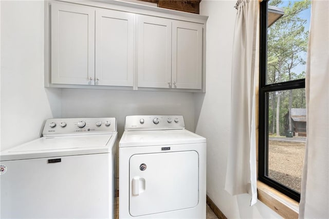 306 Gnarly Maple Trl, Broken Bow, OK 74728 - laundry area featuring separate washer and dryer, plenty of natural light, and cabinet space