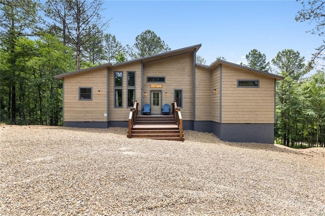 306 Gnarly Maple Trl, Broken Bow, OK 74728 - view of front of house with a wooden deck and crawl space