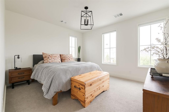 1900 Runway Blvd, Oklahoma City, OK 73108 - bedroom featuring light carpet