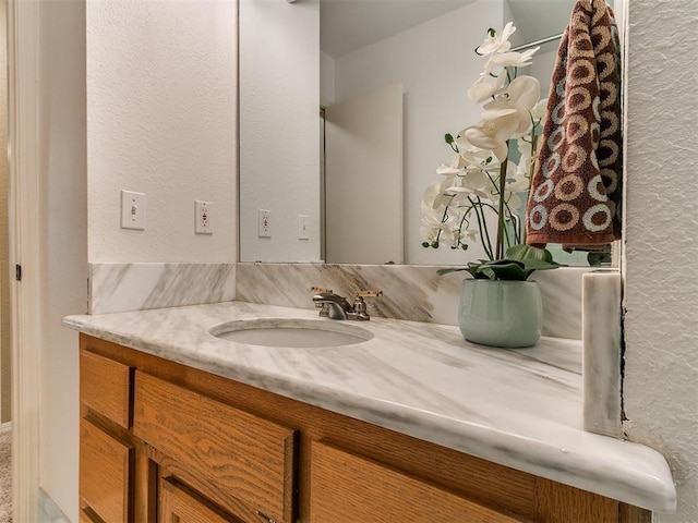 1221 Val Genes Rd, Edmond, OK 73003 - bathroom with vanity and backsplash