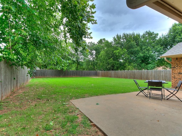 1221 Val Genes Rd, Edmond, OK 73003 - fenced backyard featuring a patio area