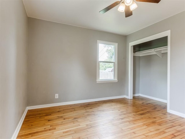 1125 E Fay St, Shawnee, OK 74801 - unfurnished bedroom with light wood-type flooring, a closet, and ceiling fan