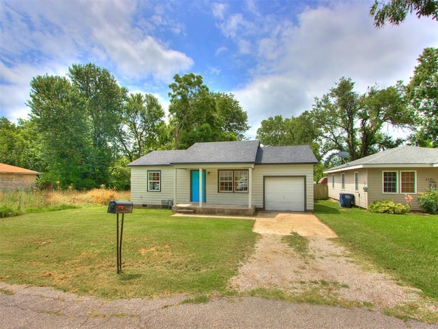 1125 E Fay St, Shawnee, OK 74801 - view of front of house with dirt driveway, a garage, and a front lawn