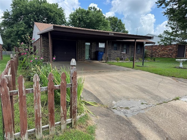 1217 Dove Hollow Dr, Tecumseh, OK 74873 - single story home with brick siding, driveway, and an attached carport